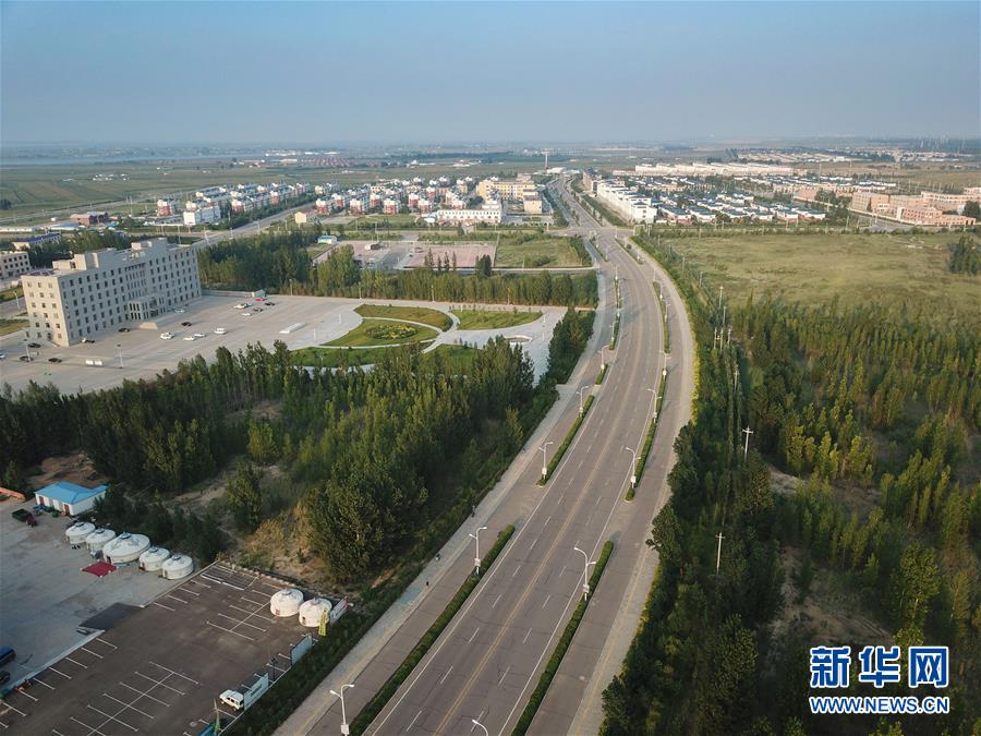 (bbin宝盈全媒头条·在习近平新时代中国特色社会主义思想指引下——新时代新作为新篇章·图文互动)(8)绿富同兴画卷在沙海中铺展——库布其沙漠生态治理纪实