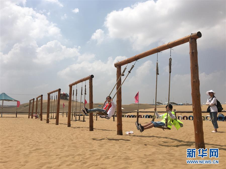 (bbin宝盈全媒头条·在习近平新时代中国特色社会主义思想指引下——新时代新作为新篇章·图文互动)(11)绿富同兴画卷在沙海中铺展——库布其沙漠生态治理纪实